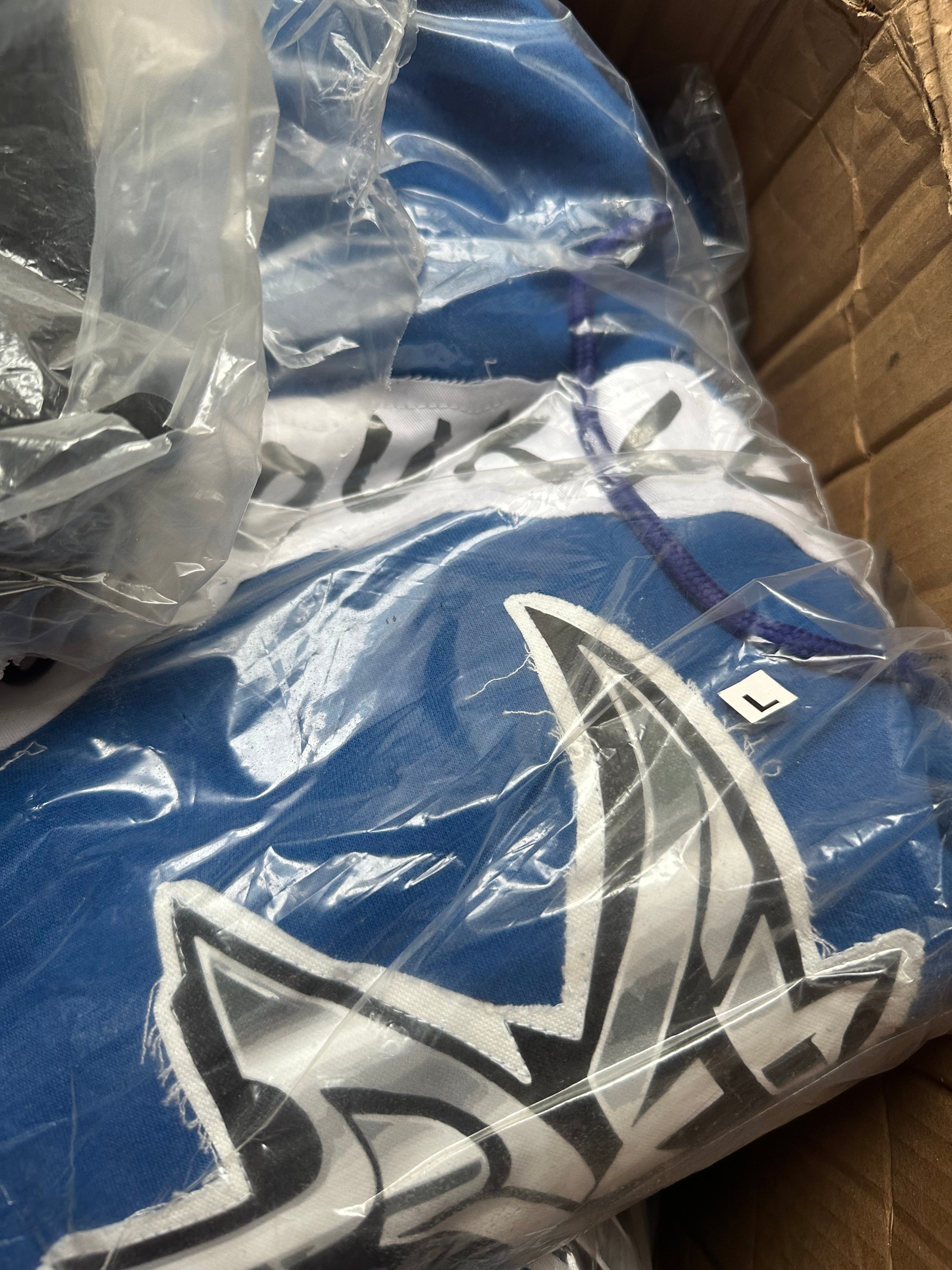 Deluxuri distressed patched sweatsuits