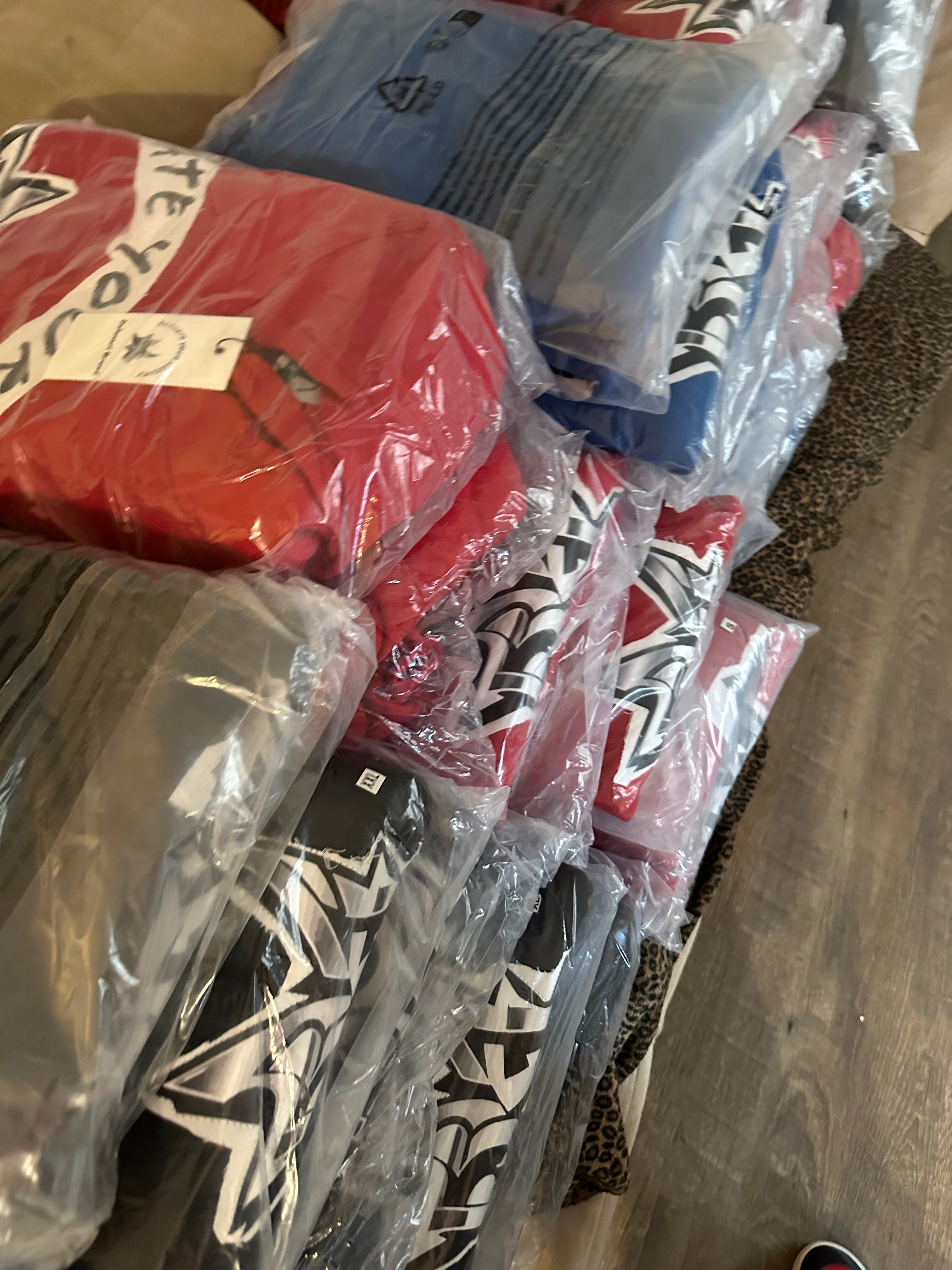 Deluxuri distressed patch sweatsuits