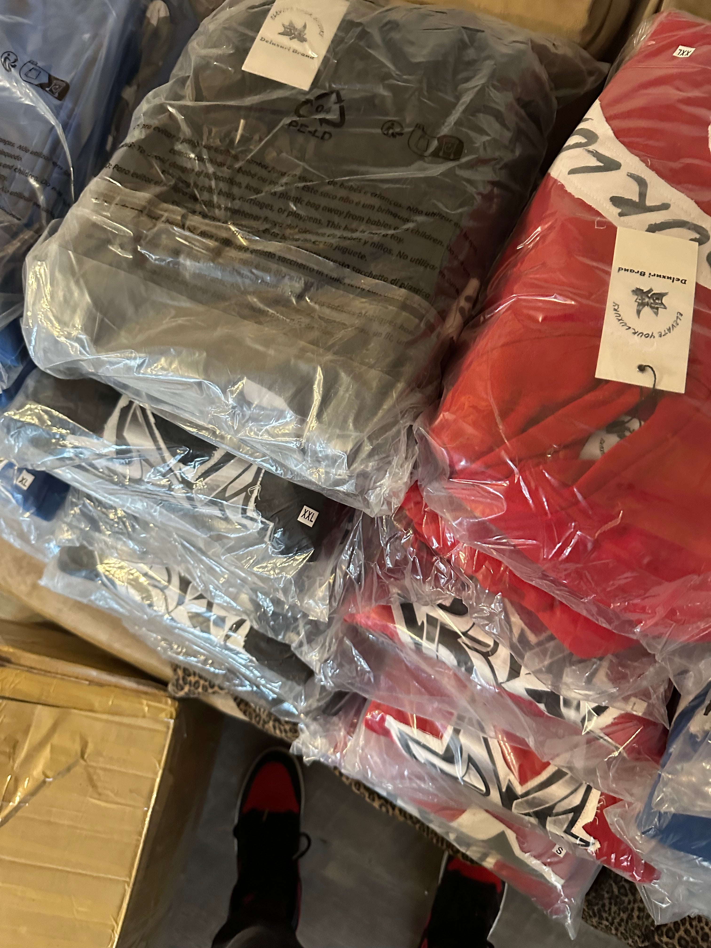 Deluxuri distressed patch sweatsuits