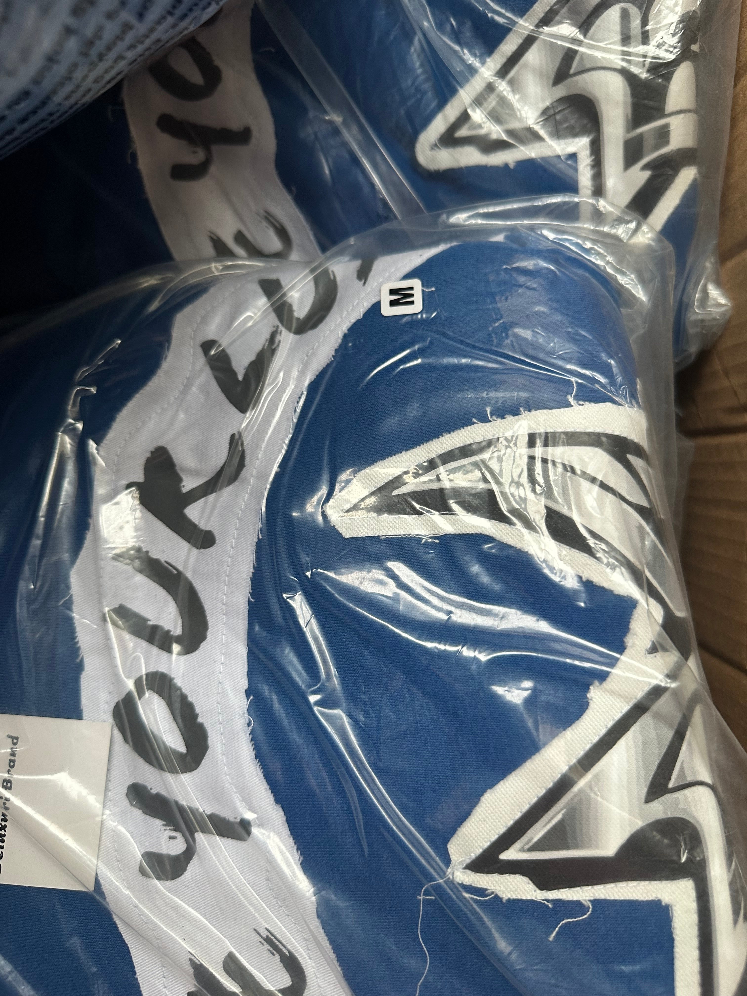 Deluxuri distressed patched sweatsuits
